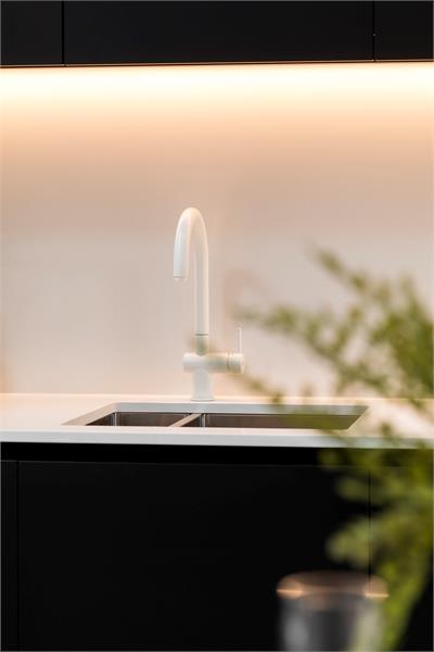 Nieuwbouwwoning met hoogwaardige afwerkingsgraad op centrale ligging 