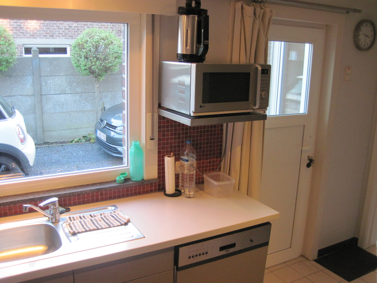 Degelijke én gezellige woning. Met tuin en met garage. 