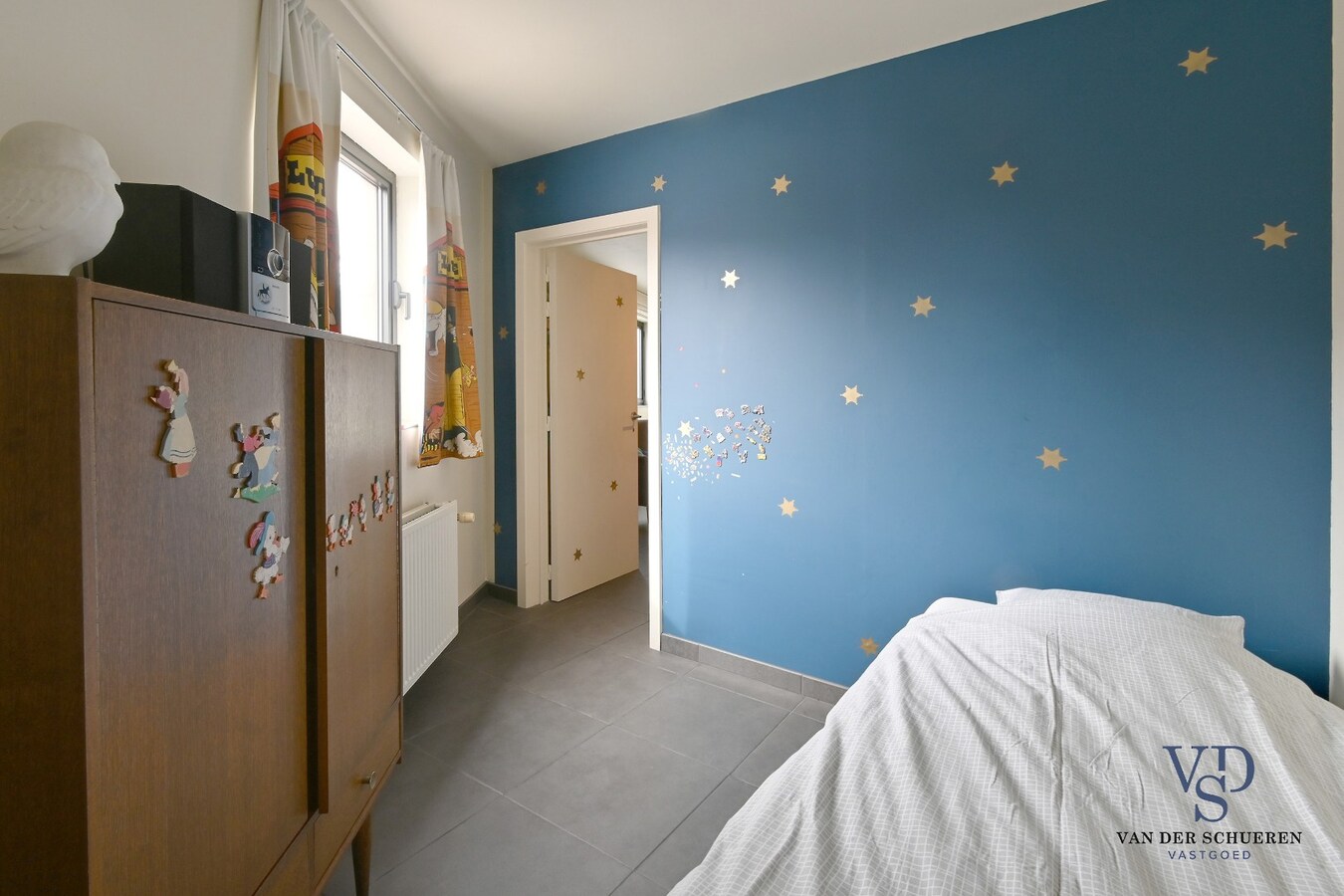 Ruim appartement in hartje Zingem. 