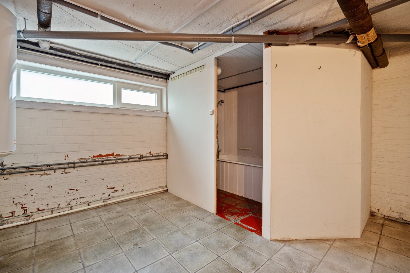 Solide en op te frissen woning te koop vlakbij centrum Lozer 