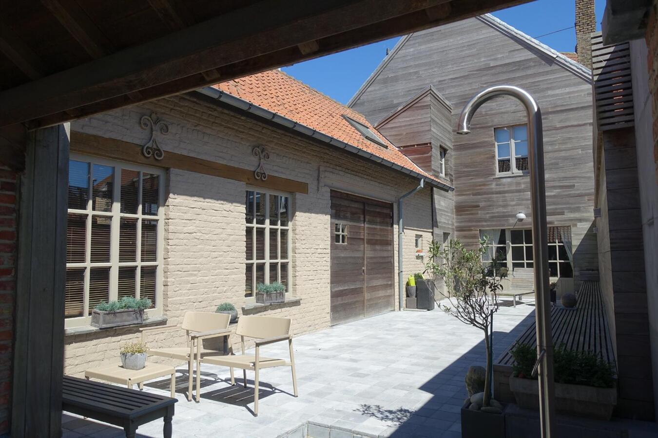 Klassevolle herenwoning met praktijkruimte 