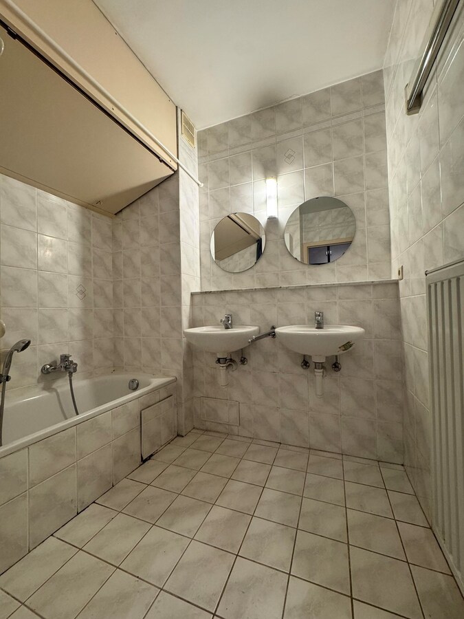 Appartement met 2 slaapkamers en autostandplaats in centrum Leuven 