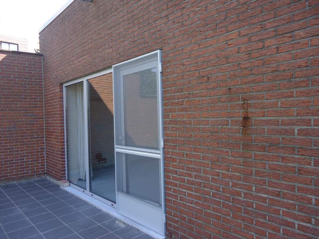 Commercieel gelegen winkel  met  parking 