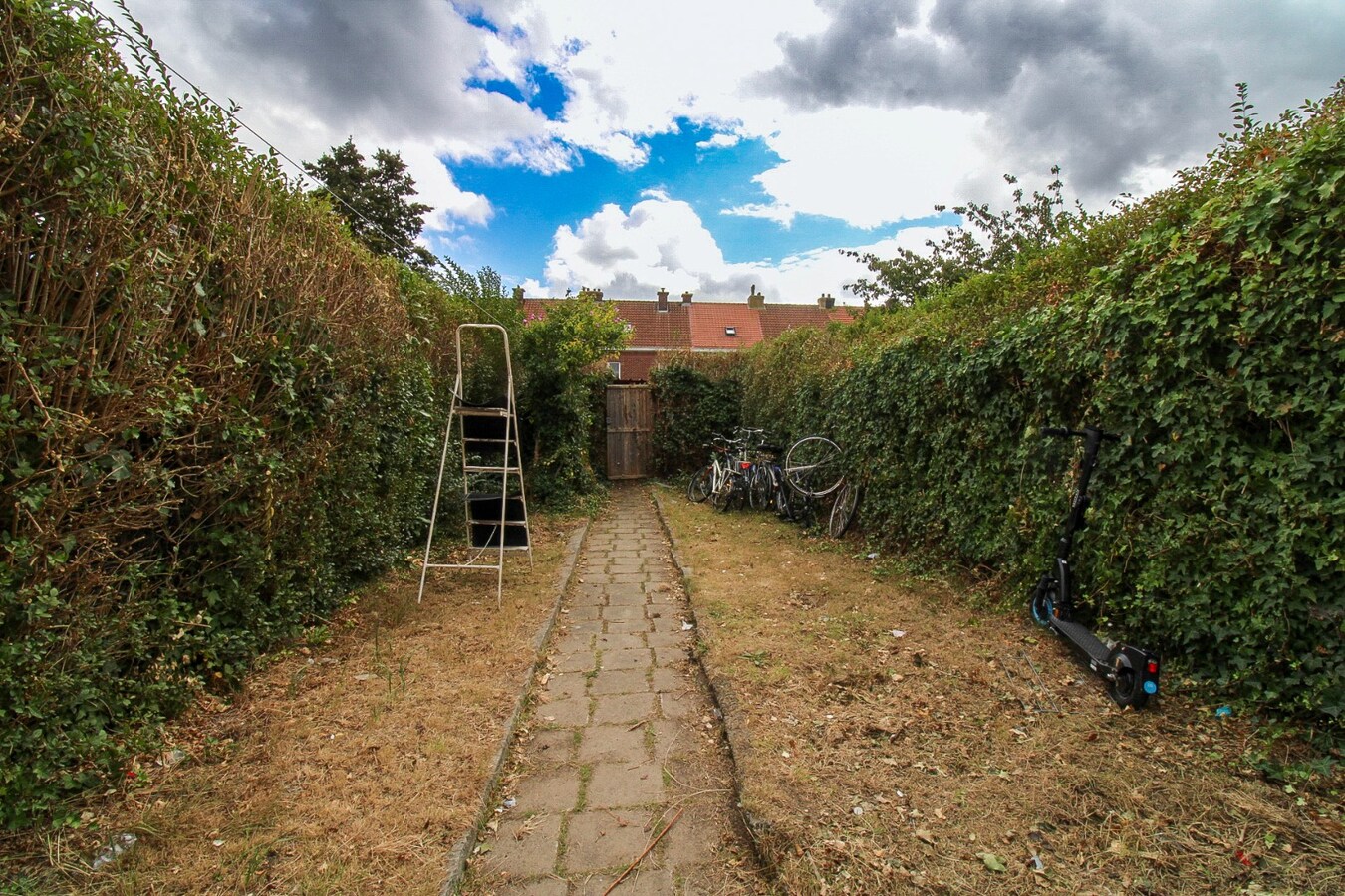 Te koop: Charmante rijwoning met diepe tuin in hartje Sint-Niklaas! 