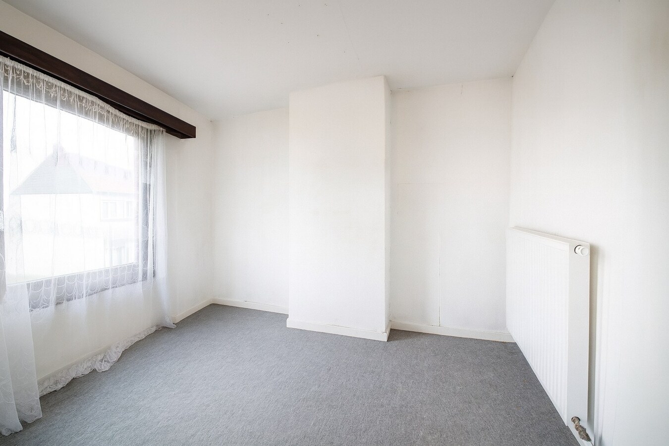 Te koop: Charmante rijwoning met diepe tuin in hartje Sint-Niklaas! 