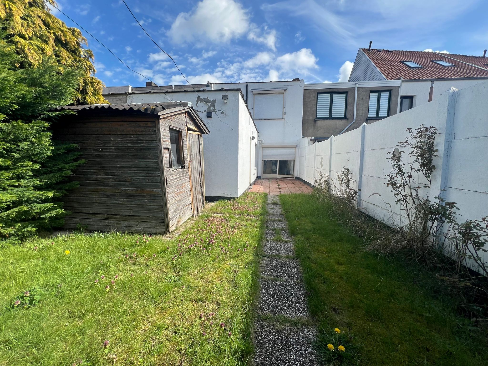 Te renoveren woning gelegen in het Oude Knokke met zuid- west gerichte tuin 