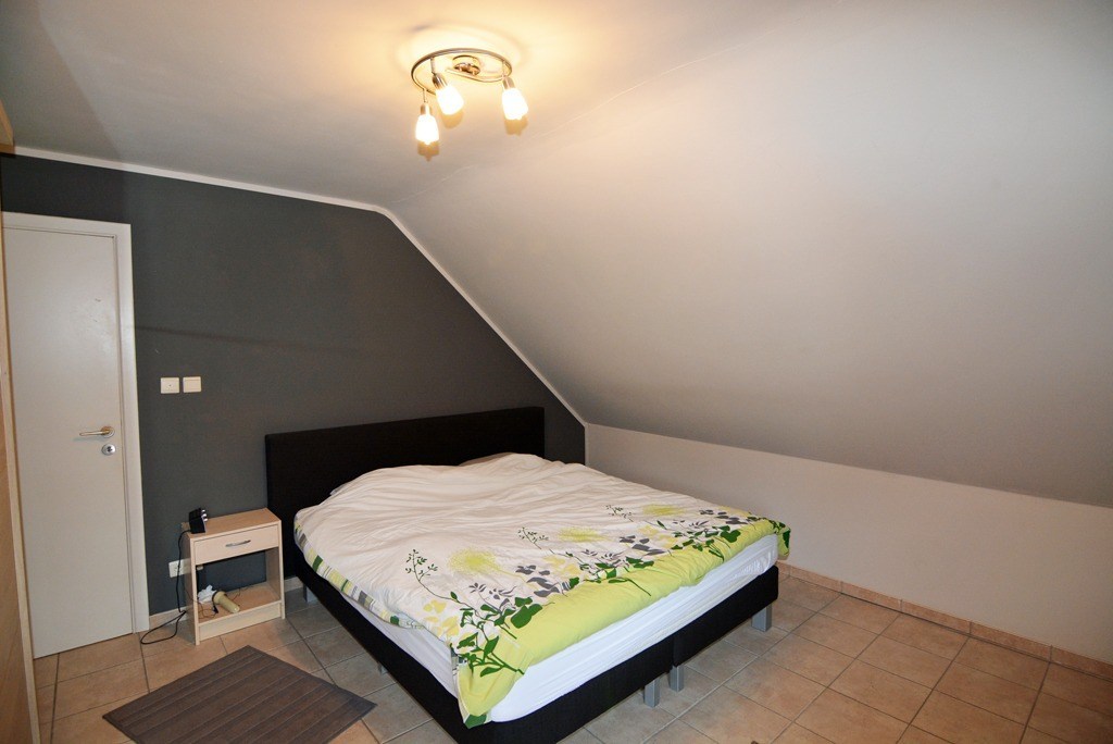 Energiezuinig appartement met 2 slpks, terras en inpandige garage. 
