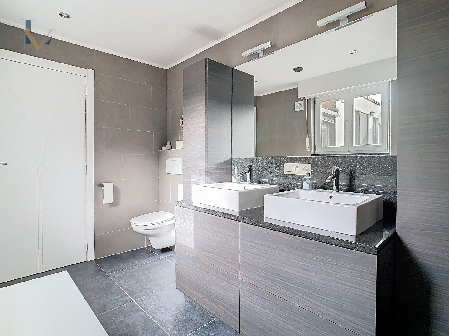 Instapklare rijwoning met tuin en garage nabij Park Vrieselhof – rustige ligging in Oelegem 