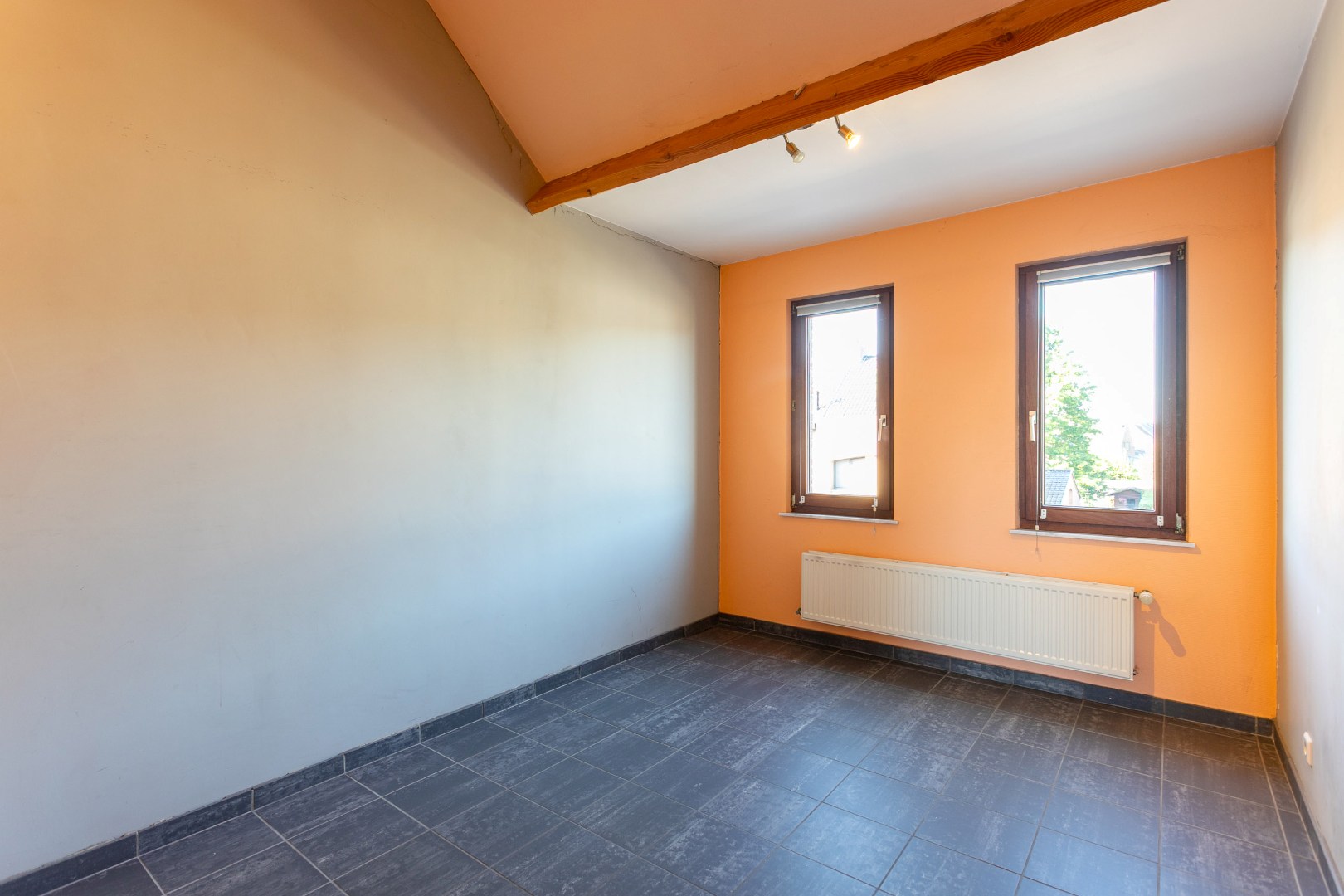 Karaktervolle architectenwoning (EPC B) met 3 slpks, garage en tuin te Lot 