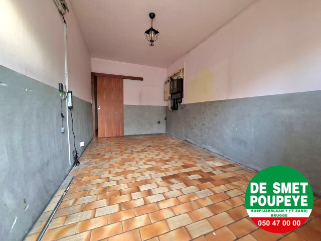 Ruime rijwoning met garage en tuin 