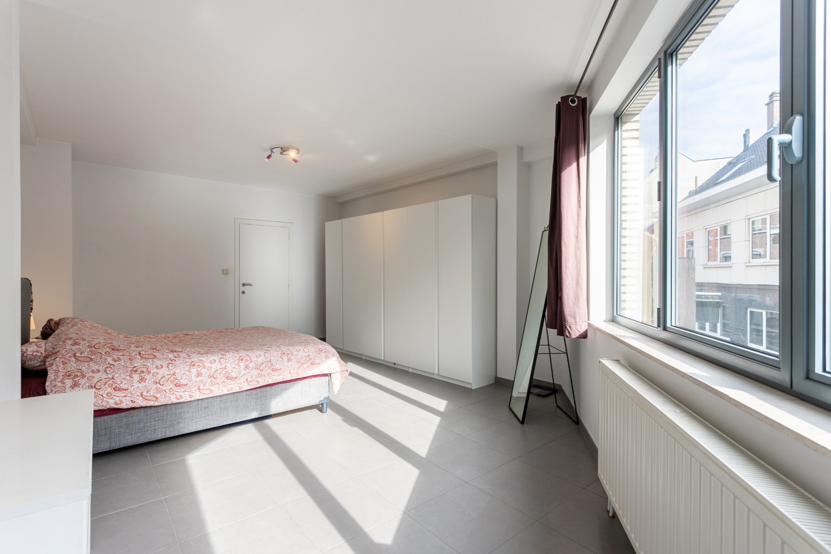 Handelspand met woonst te Halle centrum 