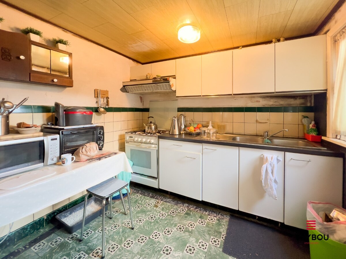 Ruime gezinswoning met 4 slaapkamers, garage en tuin 