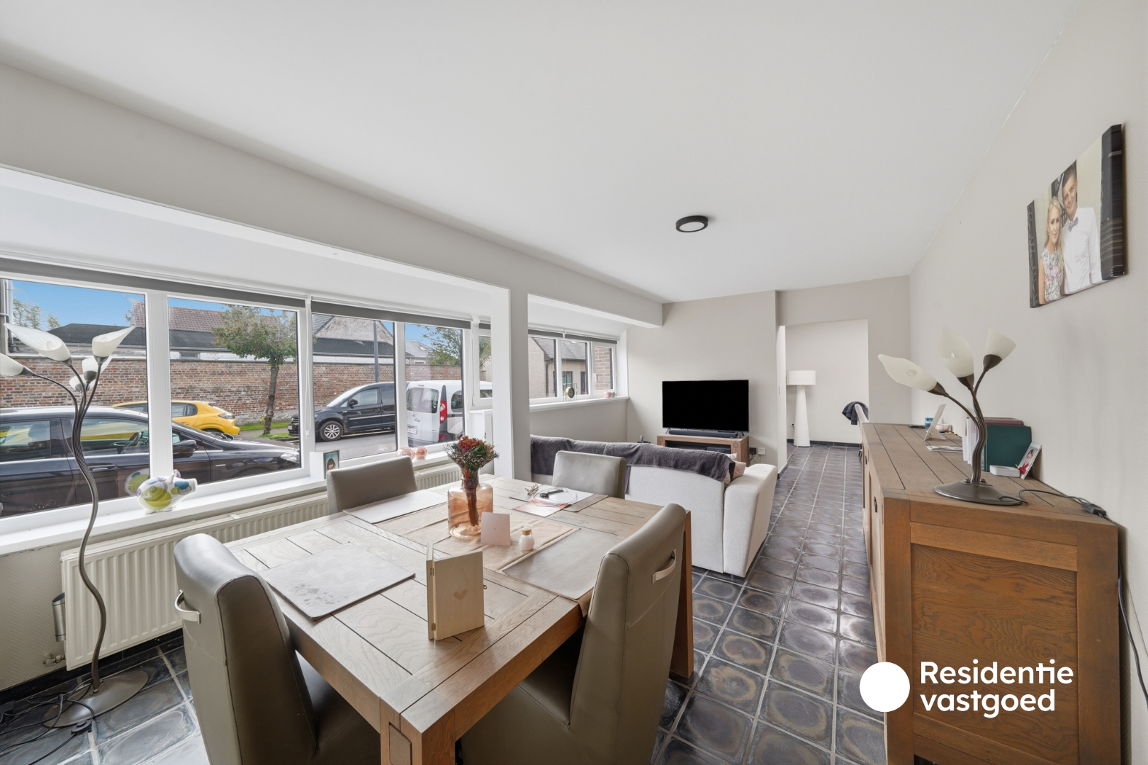 Opbrengsteigendom met 3 appartementen, garage en zonnig terras 