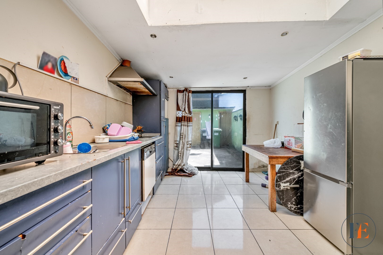 Te renoveren woning met stadskoer 