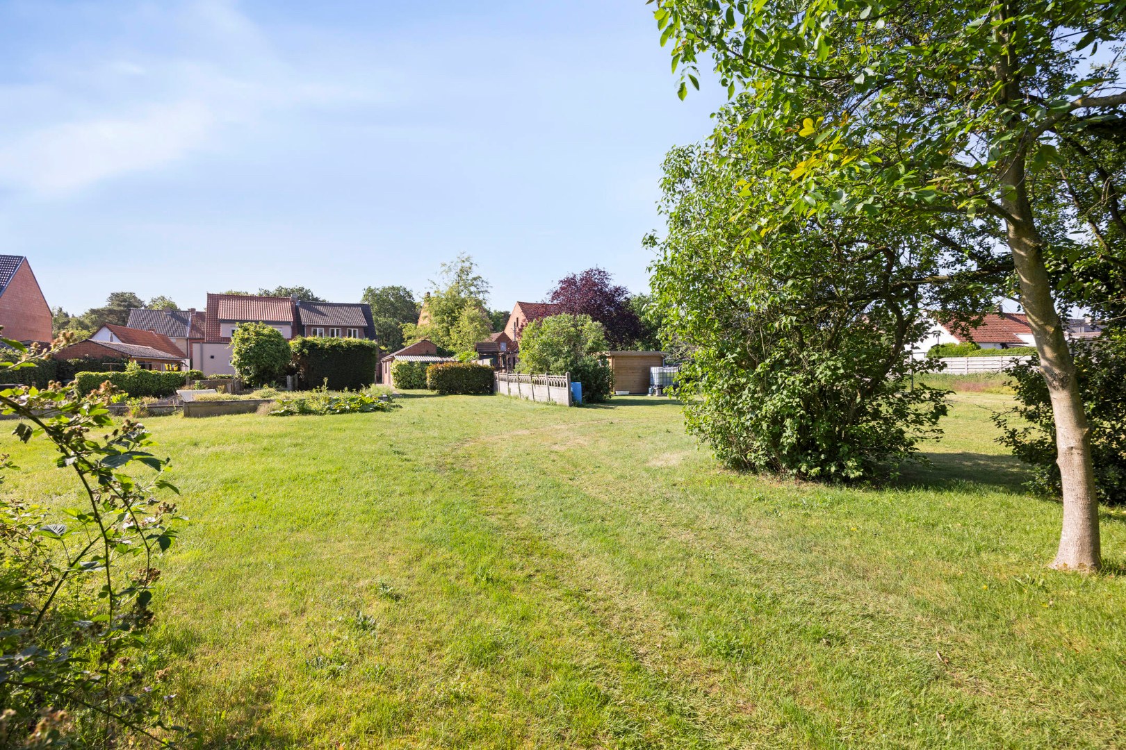 Halfopen bebouwing met 3 slpk., ruime tuin en garage in Mol 