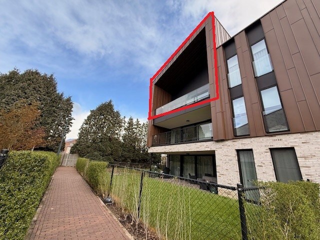 Nieuwbouwappartement met 1 slaapkamer, terras en autostandplaats te Maasmechelen. 