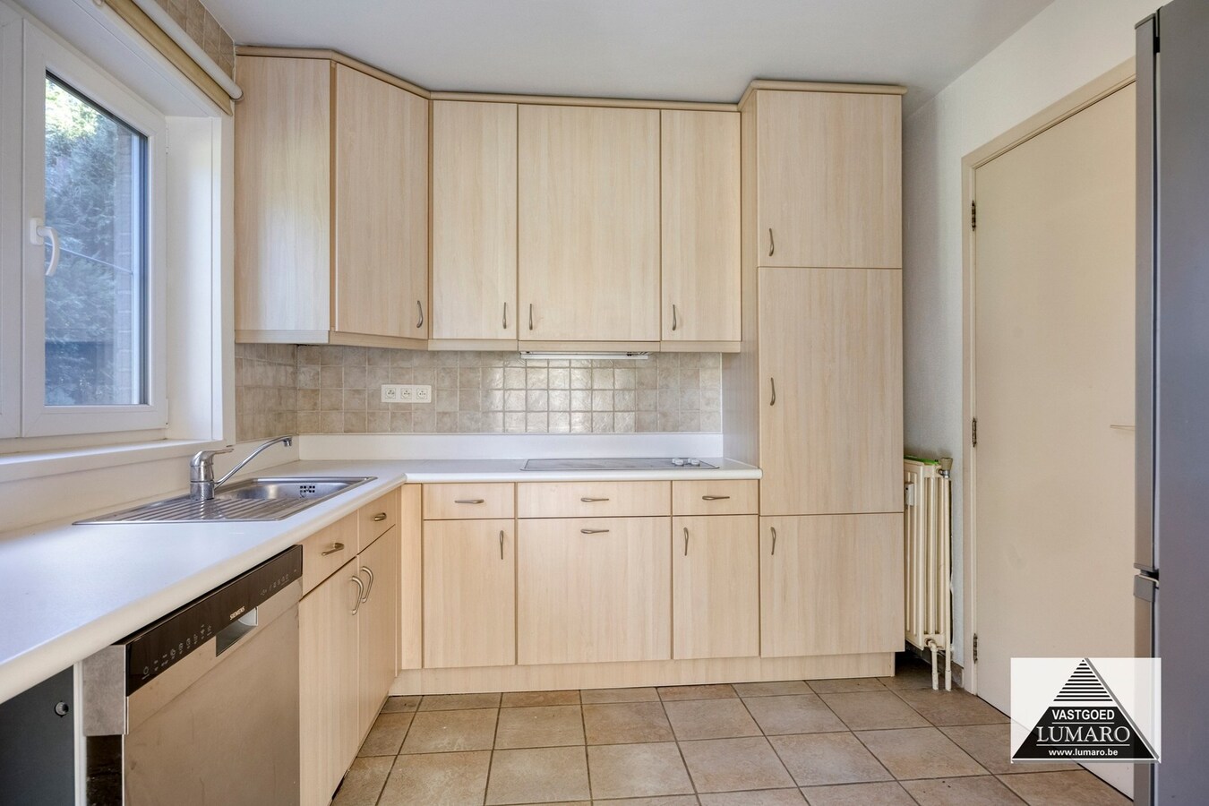Gelijkvloers appartement met 3 slaapkamers, en ruime garage 