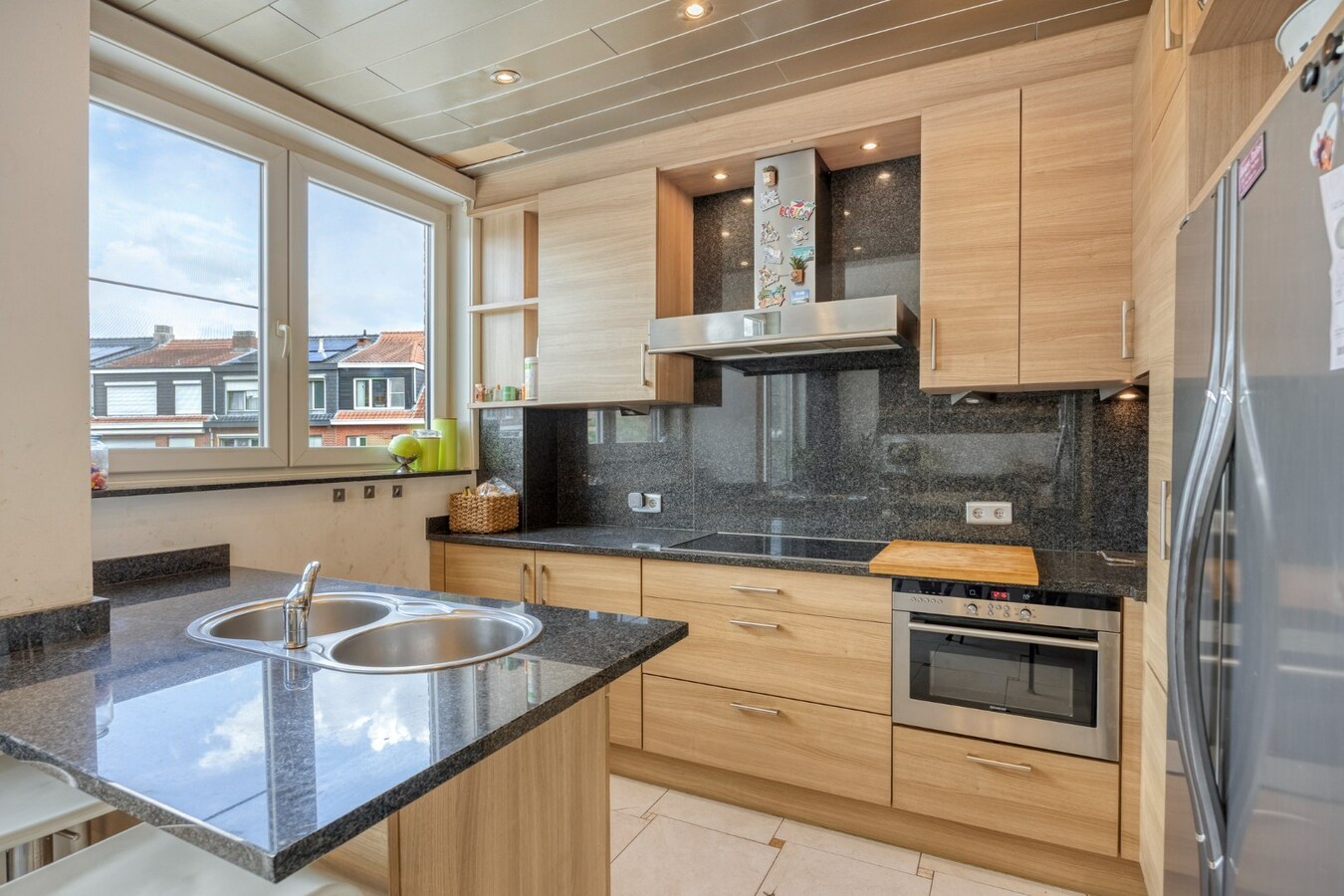 Instapklare woning met garage en tuin te Edegem 
