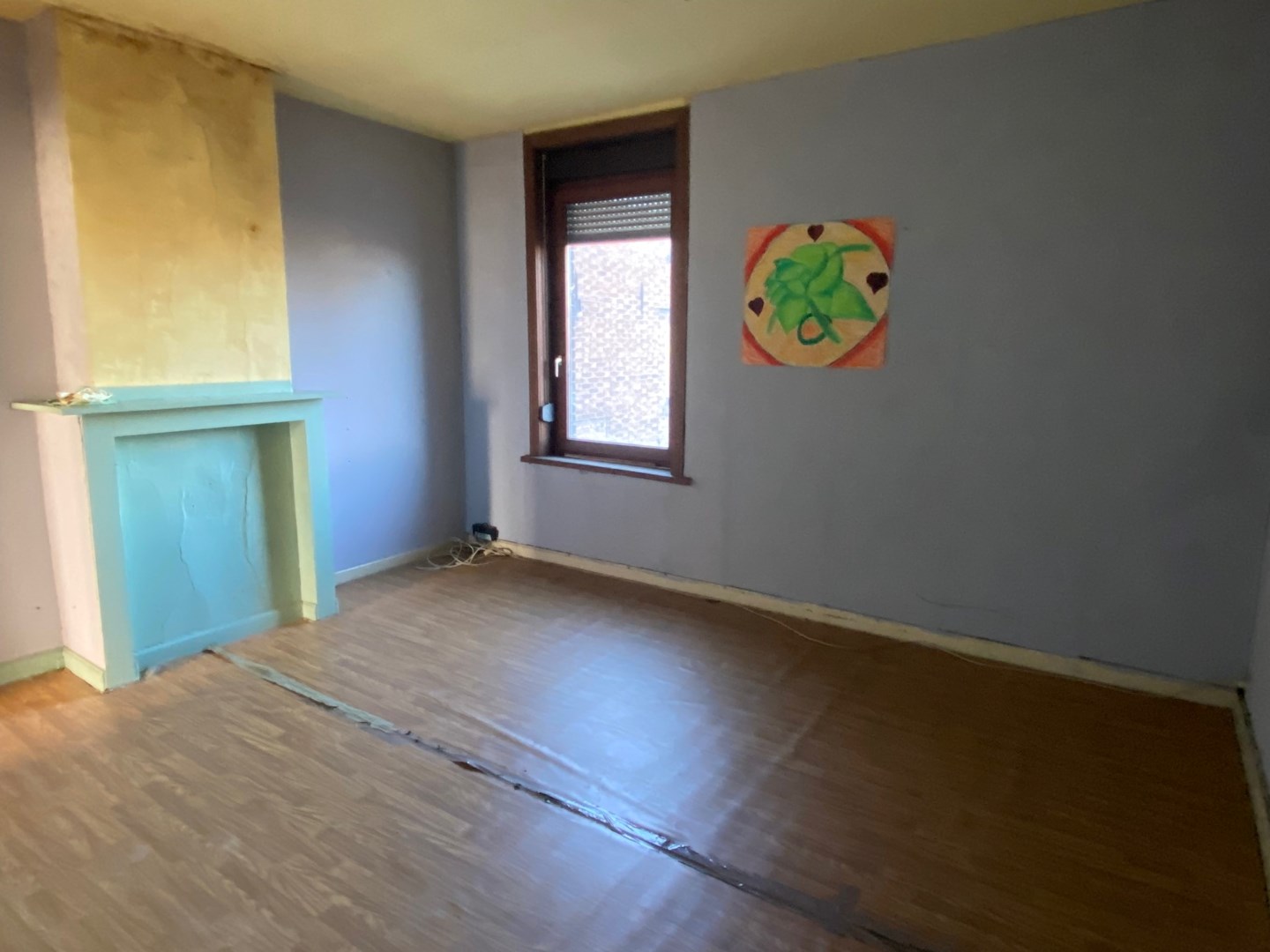 Zwevegem, te renoveren rijwoning met tuin 