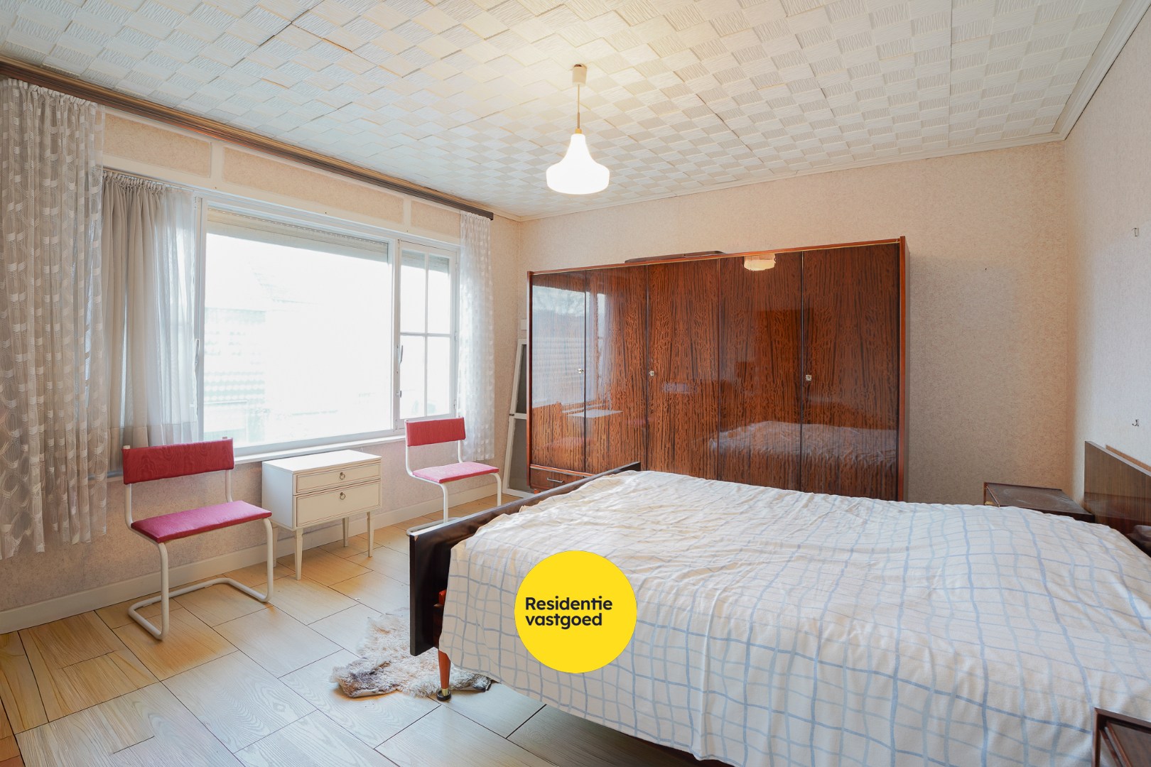 Ruime woning met zuidgerichte tuin te Sint-Michiels 