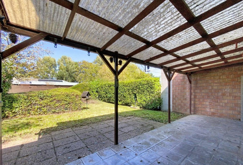 Ruime half open bebouwing met tuin en garage in Heist-aan-Zee. 