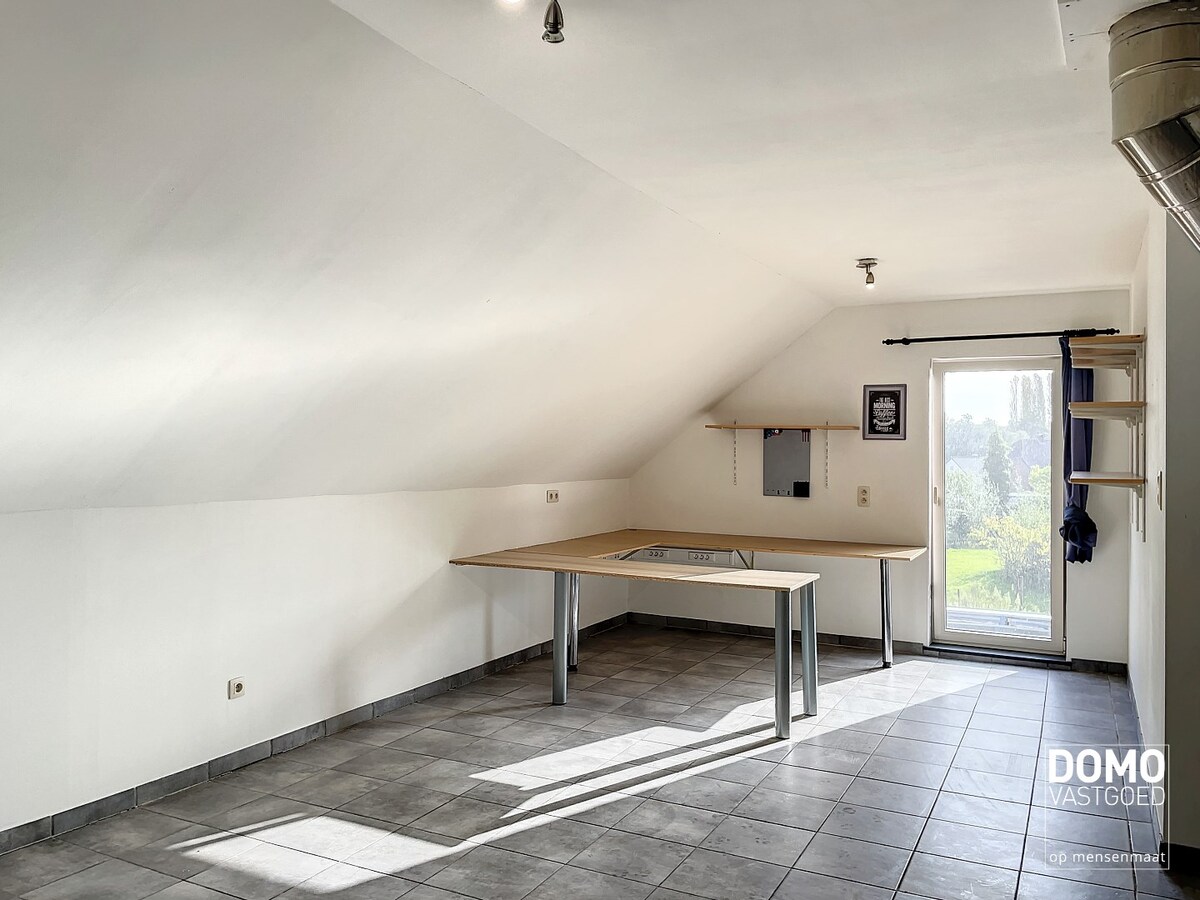 Ruim duplex appartement in Herk-de-Stad, 3 slaapkamers en tuin 