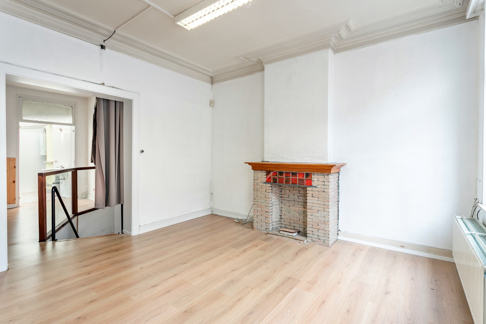 Handelshuis én appartement centrum Halle 