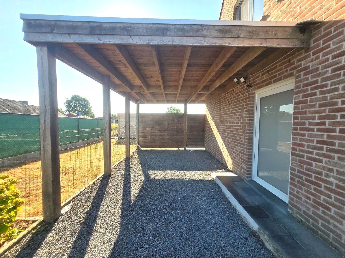 Energiezuinige halfopen woning met tuin en carport te Zulte 