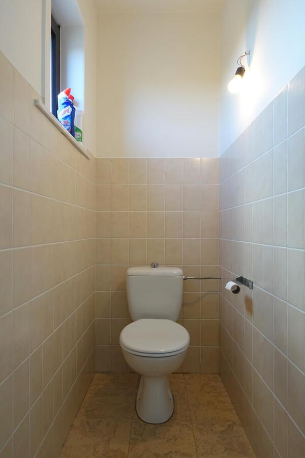 Gezellige half-open woning met zonnige tuin 