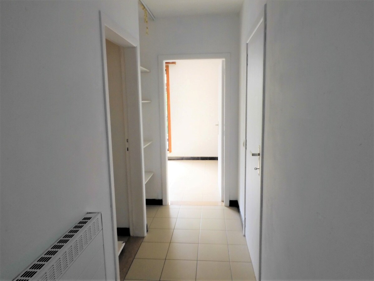 Aangenaam éénslaapkamerappartement met terras en privatieve garagebox 