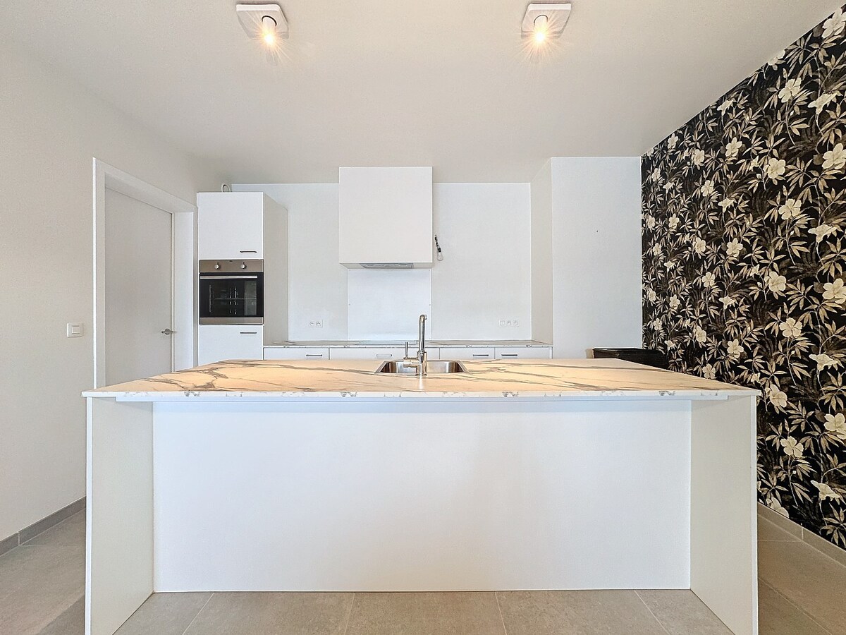 Nieuwbouw appartement met ruim terras en kelder te centrum Zottegem 