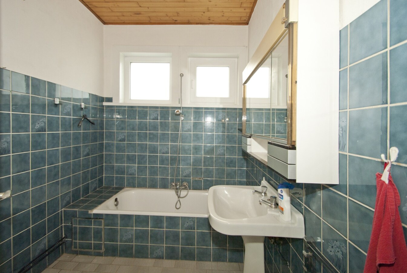 Gelijkvloers woning met tuin -  3 slpks 