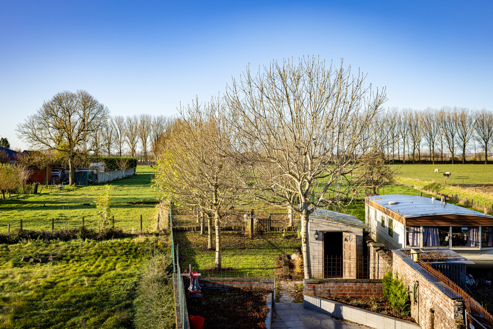 Gerenoveerde woning met 3 slpks, tuin en zicht op de weilanden 