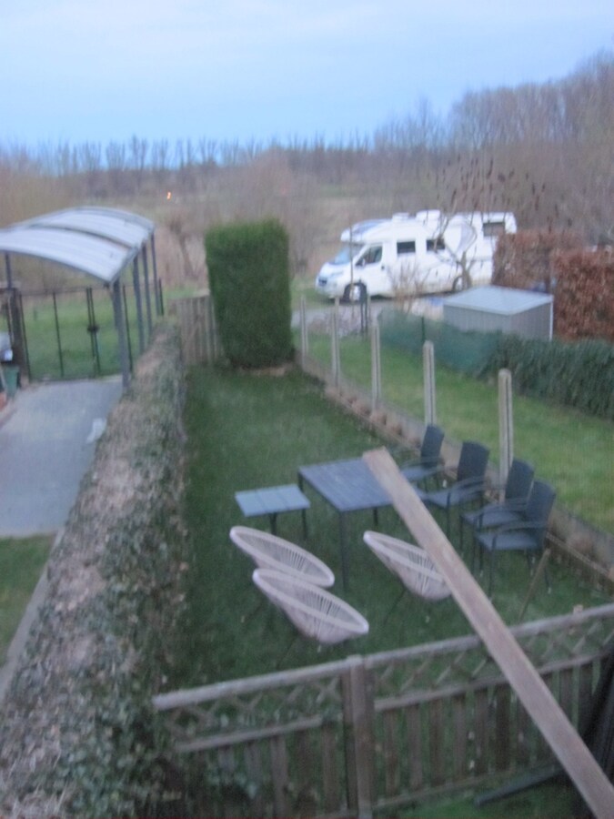 Gezellige woning met garage, tuintje én met uitzicht op de Schelde! 