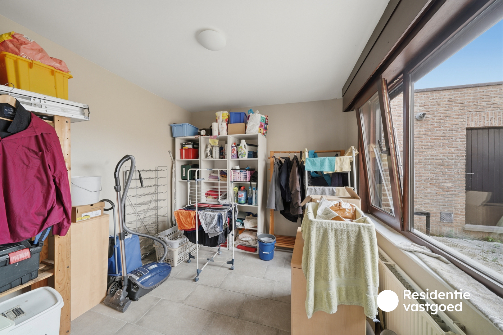 Opbrengsteigendom met 3 appartementen, garage en zonnig terras 