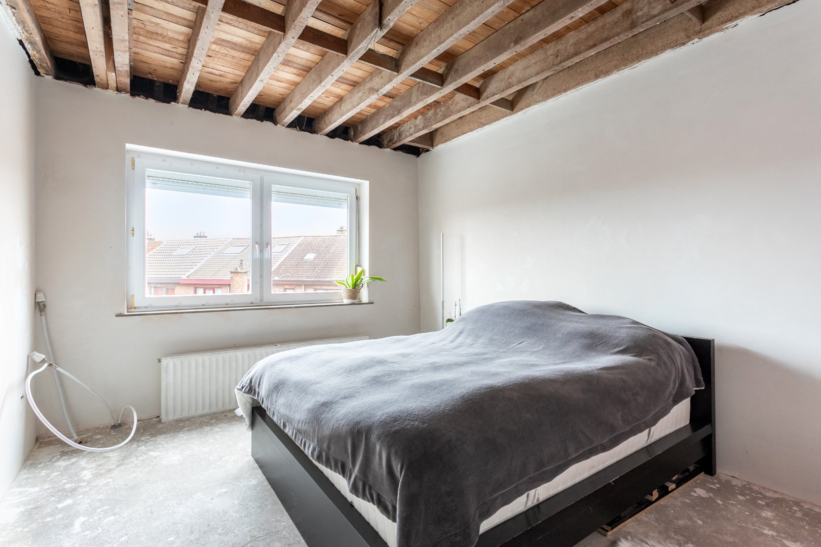 Rustig gelegen halfopen woning met 3 slpks en tuin te Buizingen 