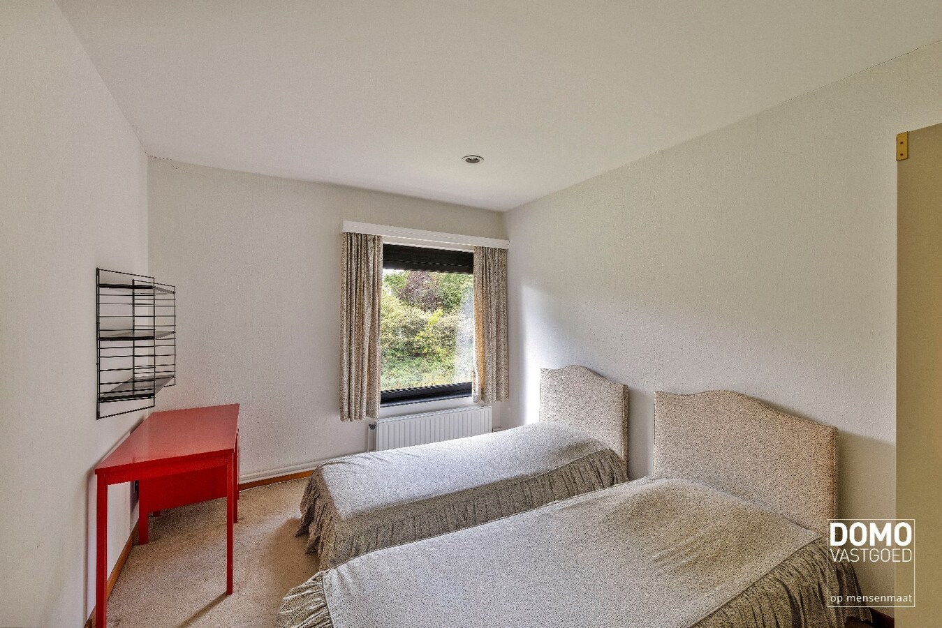 Exclusieve statige open bebouwing met zuid gerichte tuin in het centrum van Kermt (Hasselt) 