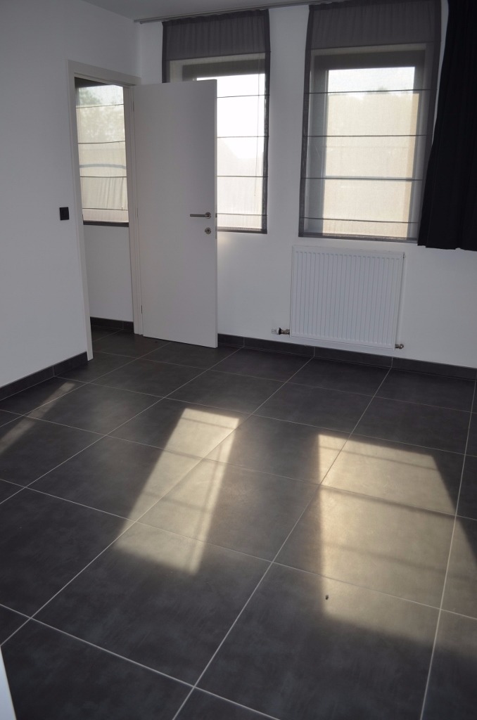 Recente halfopen bebouwing met 4 slpks en tuin te Maldegem 