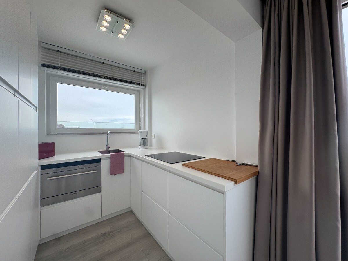 Exclusief hoekpenthouse met uitzonderlijk zeezicht en riant zonneterras in Heist. 