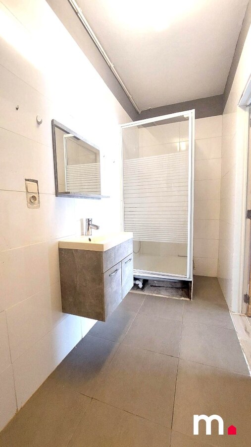 TE RENOVEREN GELIJKVLOERS APPARTEMENT TE BREDENE 