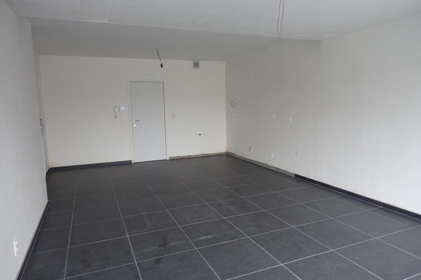 Gelijkvloersappartement met tuin en 2 autostaanplaatsen 