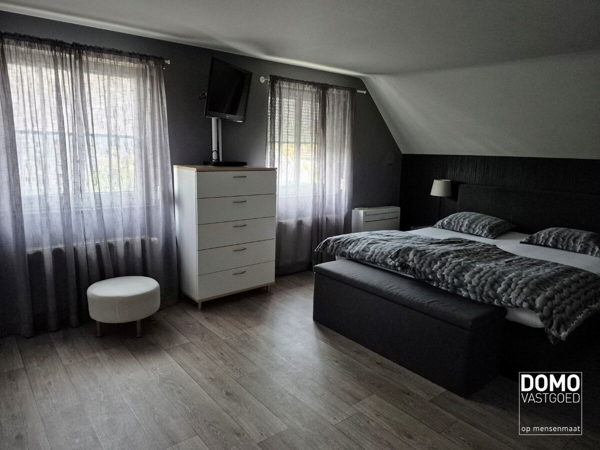 Warme gezinswoning met prachtige tuin in hartje Kortessem 