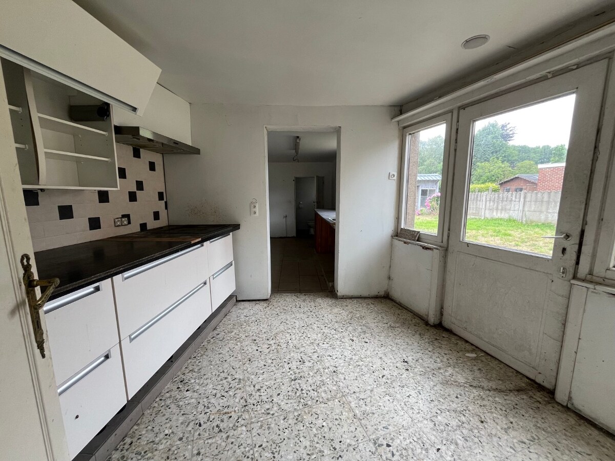 Te renoveren half open bebouwing te Gavere 