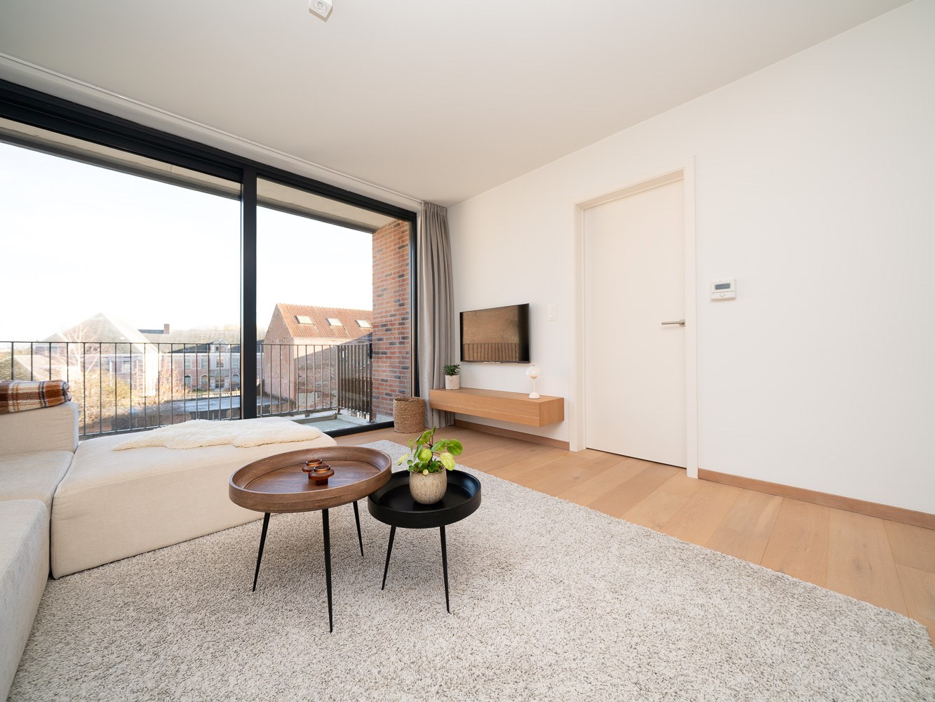 Recent 2-kamer appartement met terras, parking en kelder 