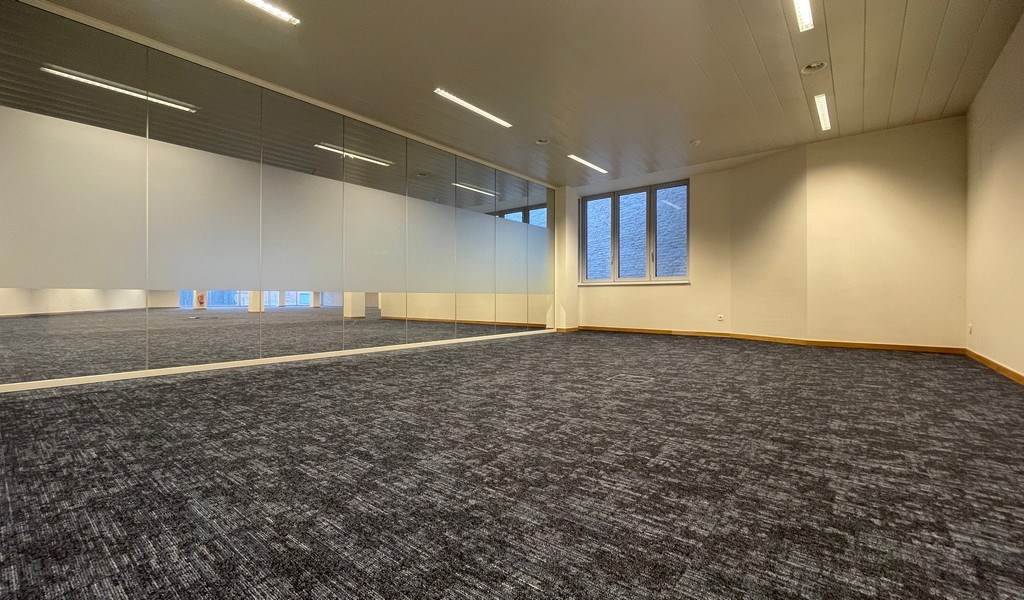 Gerenoveerde kantoren in geklasseerde herenwoning te huur aan station van Mechelen