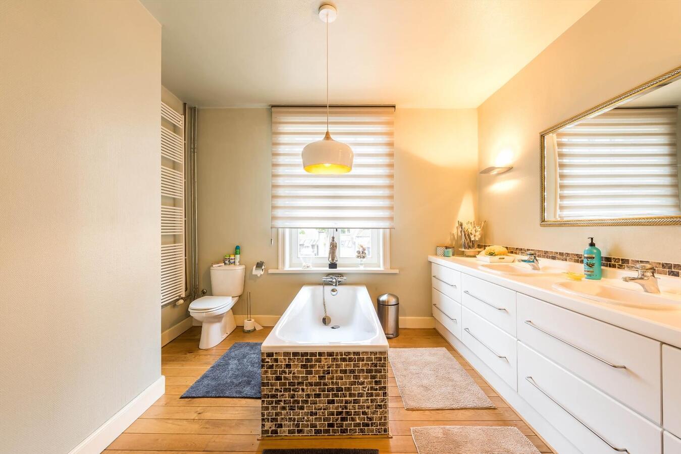 Klassevolle herenwoning met praktijkruimte 