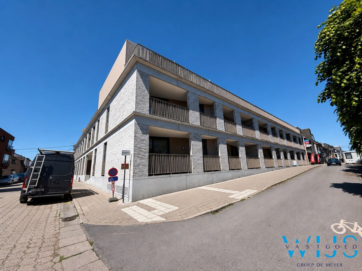 Serviceflat met parkeerplaats in hartje Ertvelde ! 