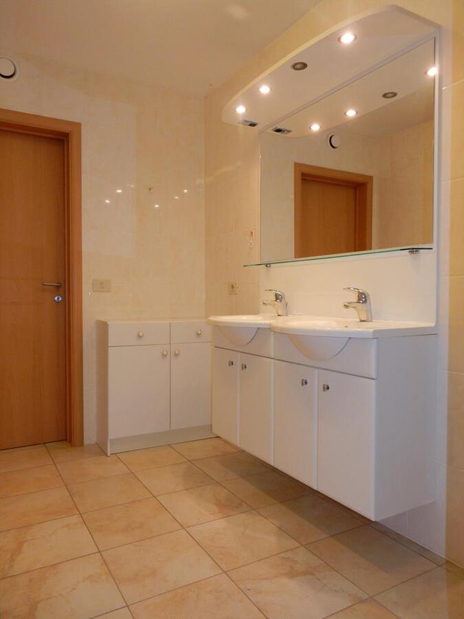 Gelijkvloers appartement met zonnige tuin 