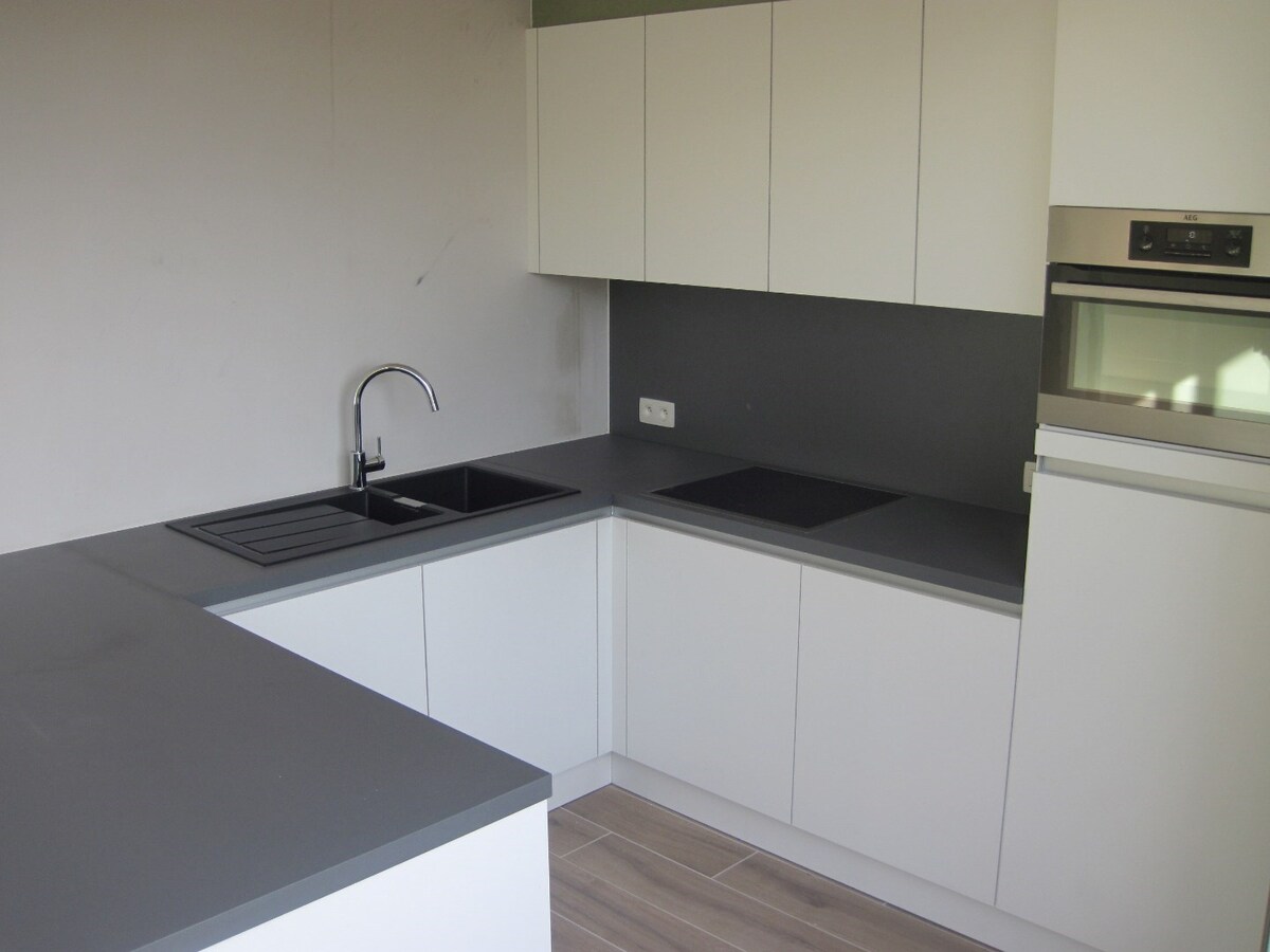 Aangename, energiezuinige nieuwbouwduplex in hartje Deinze 