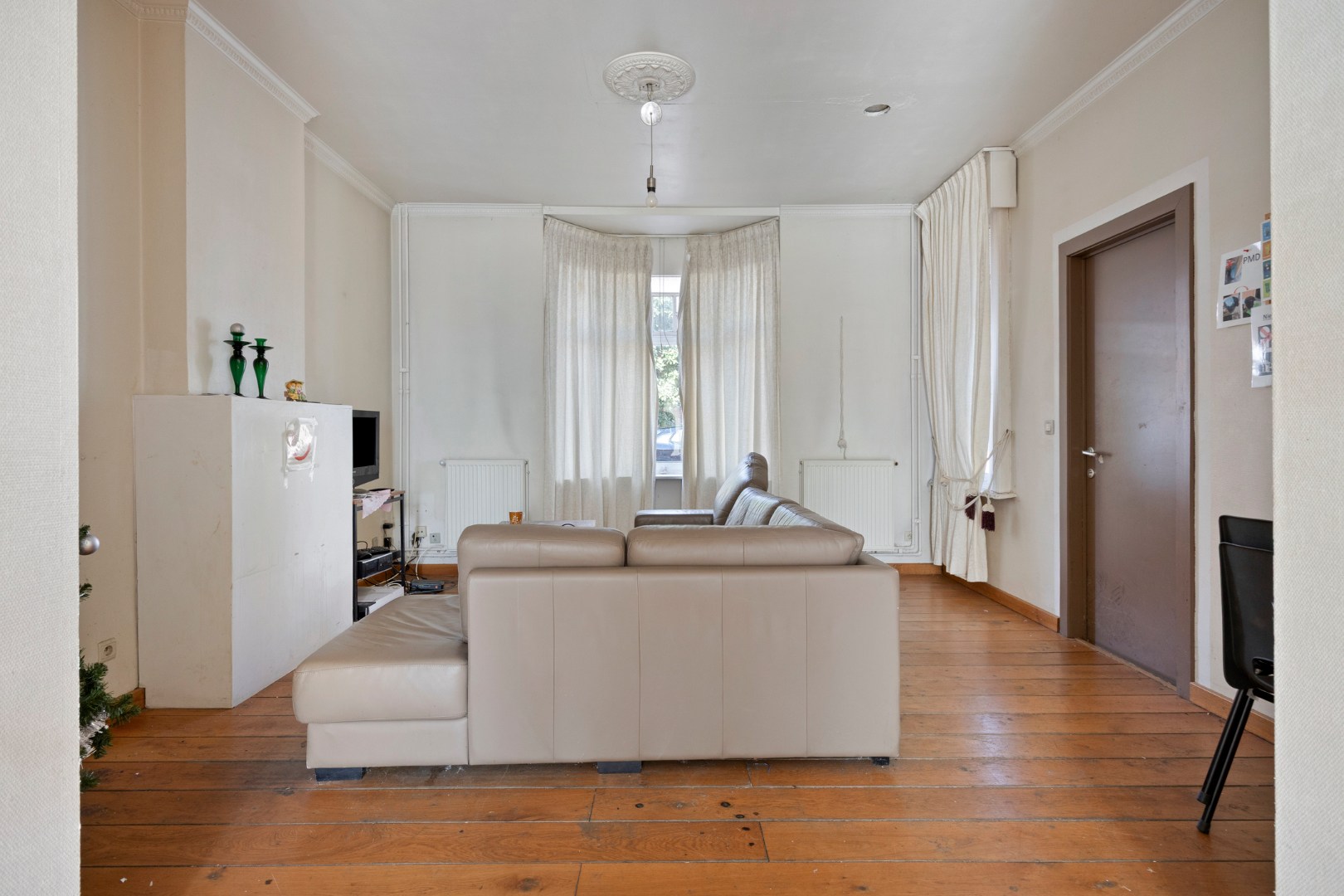 Te renoveren woning met 4 slpk. en garage in centrum van Mol 